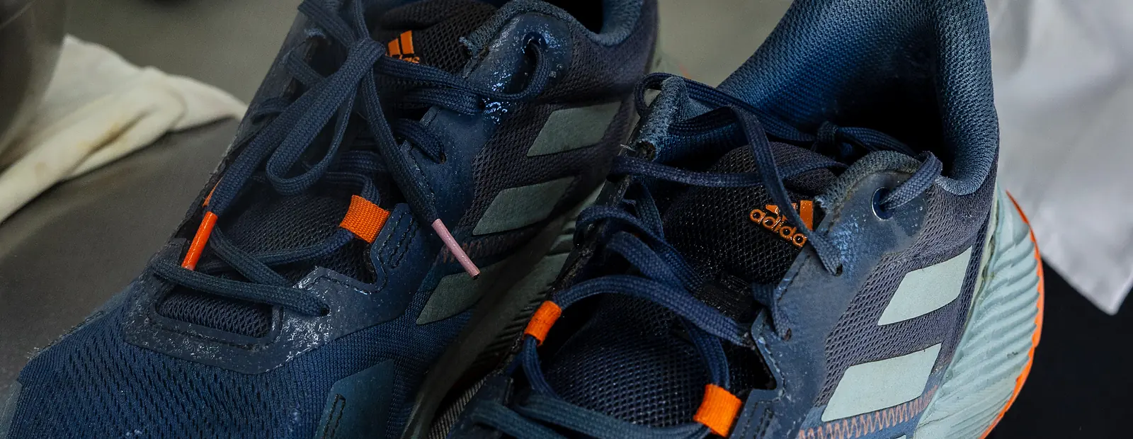 Sneakers being cleaned at QuickWash